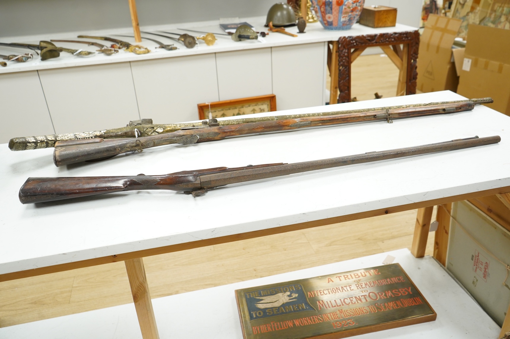 A 12 bore single barrel percussion sporting gun by J. Aston, the drum converted from flintlock, with engraved iron mounts, half stocked